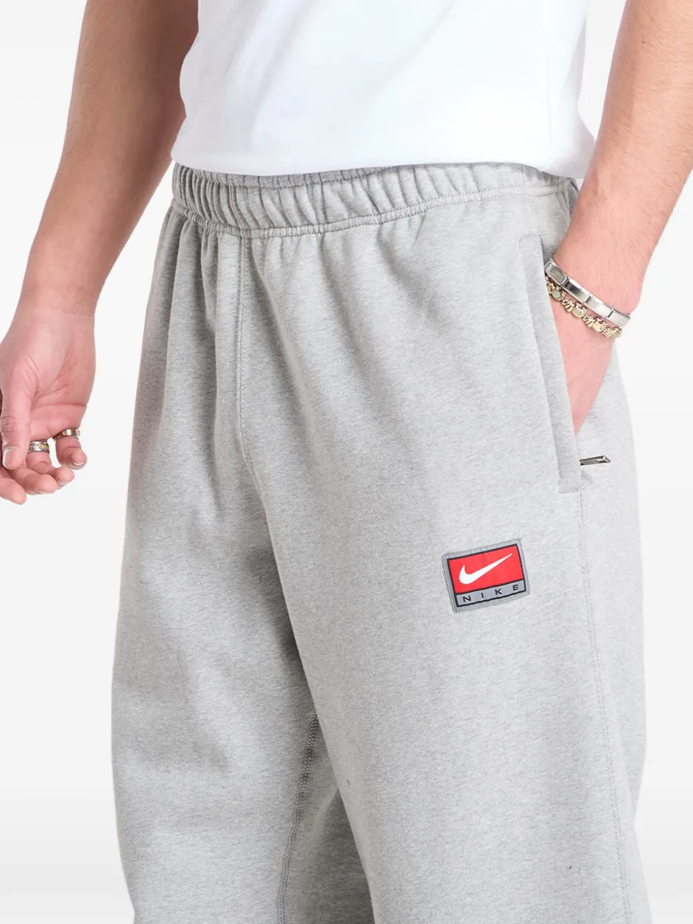 Nike Solo Swoosh trainingsbroek met open zoom Grijs