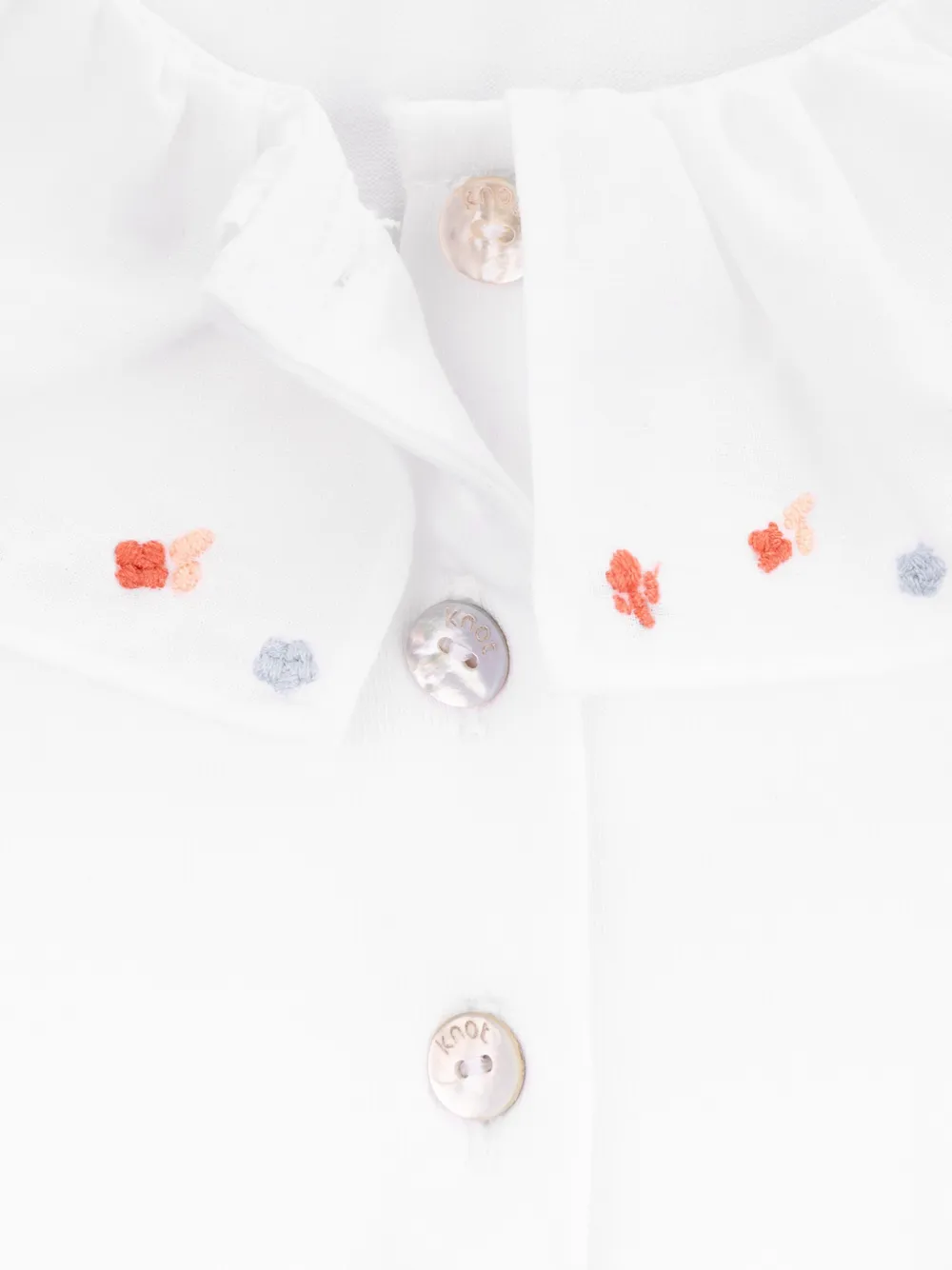 Knot Camellia poloshirt met borduurwerk Wit