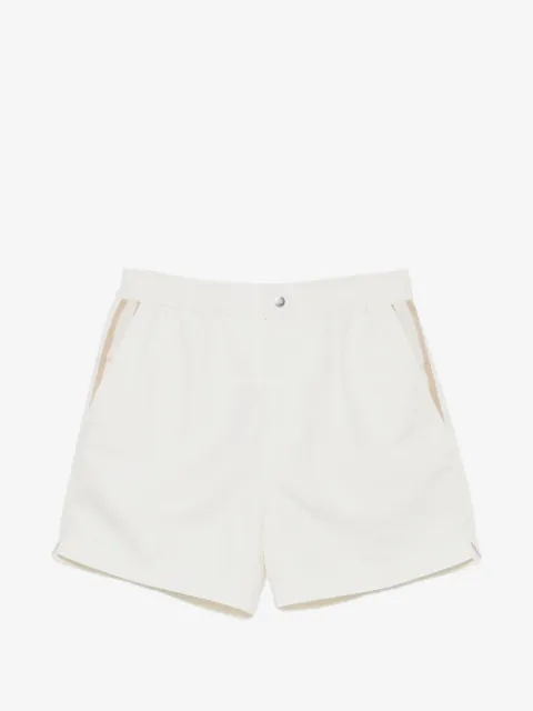CHÉ button-fastening swim shorts