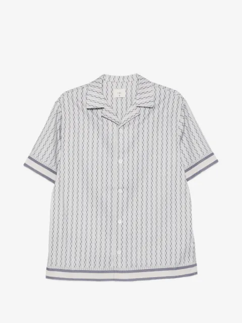 CHÉ camisa Galliano con borde estampado