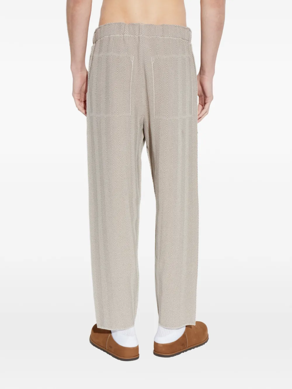 Homme Plissé Issey Miyake Elastische broek met visgraat-patroon Beige