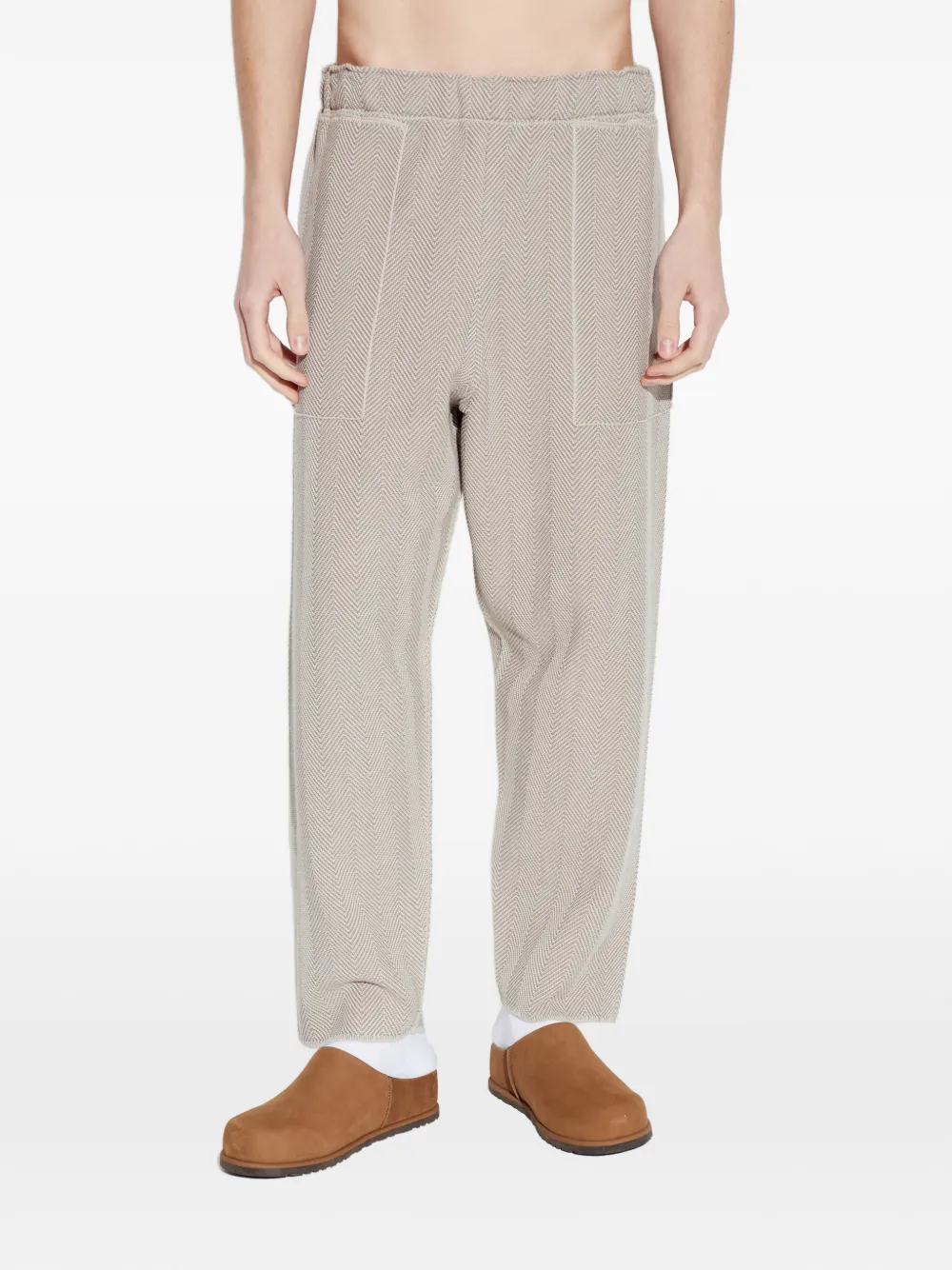 Homme Plissé Issey Miyake Elastische broek met visgraat-patroon Beige