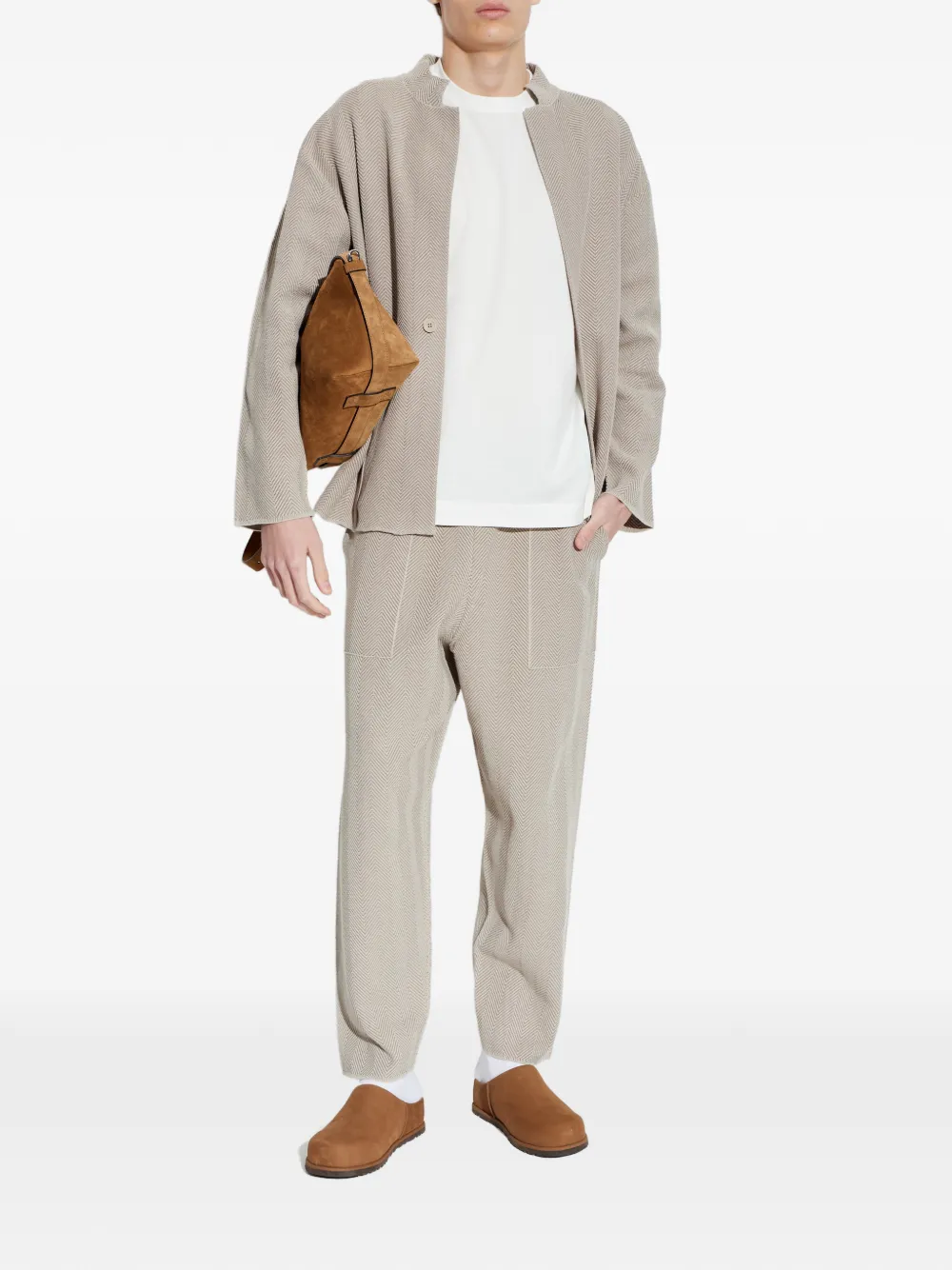 Homme Plissé Issey Miyake Elastische broek met visgraat-patroon Beige