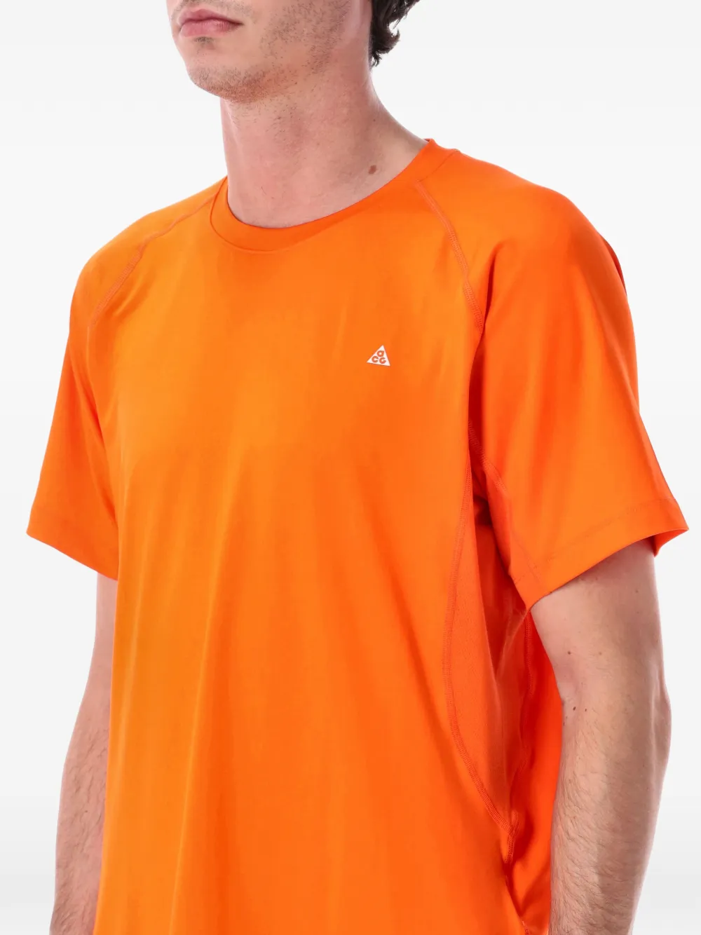 Nike Wildsee T-shirt met logodetail Oranje
