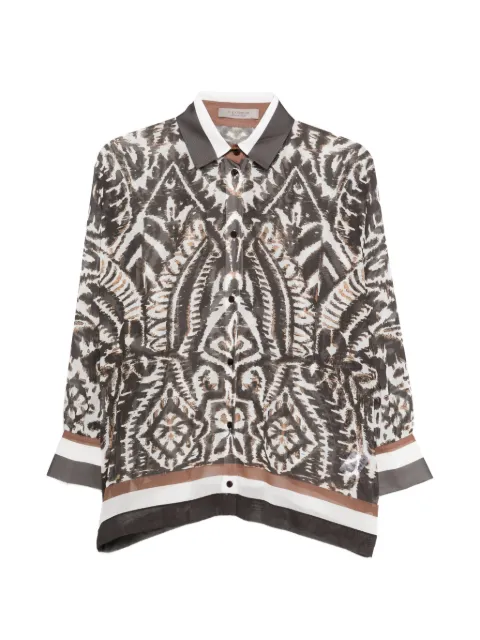 D.Exterior camisa con botones y motivo