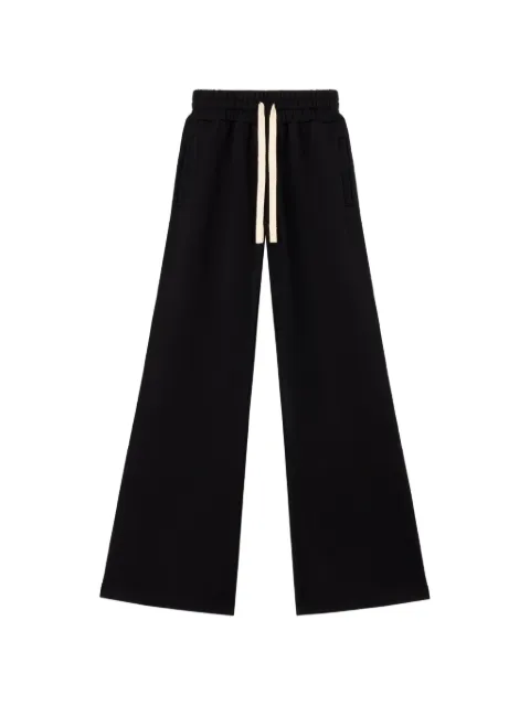 Palm Angels pants con logo curvo