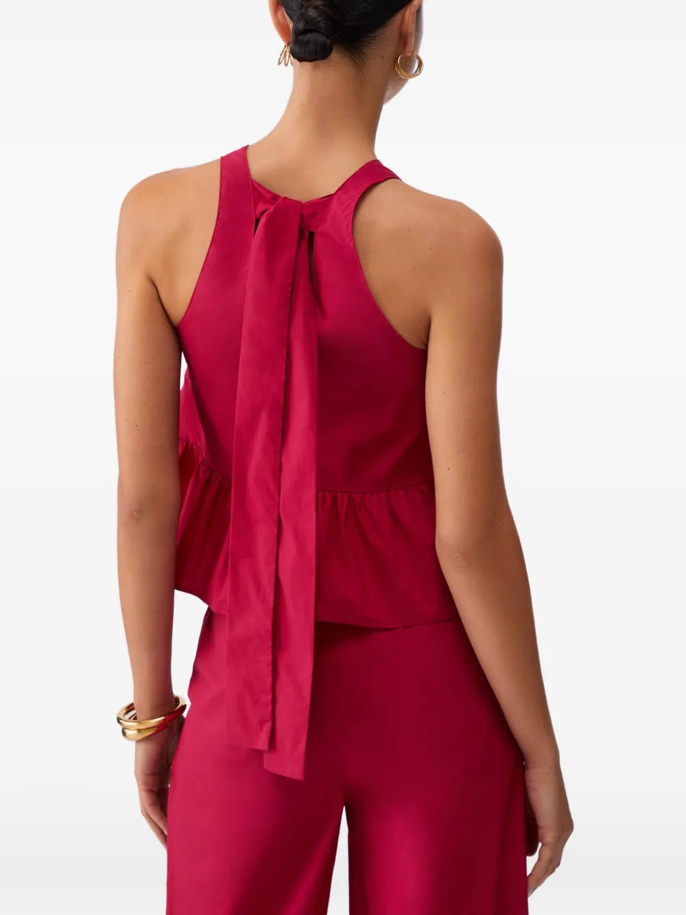 Bow-Fastening Peplum Top