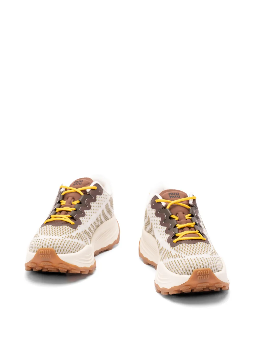 Miu Sneakers met logopatroon Beige