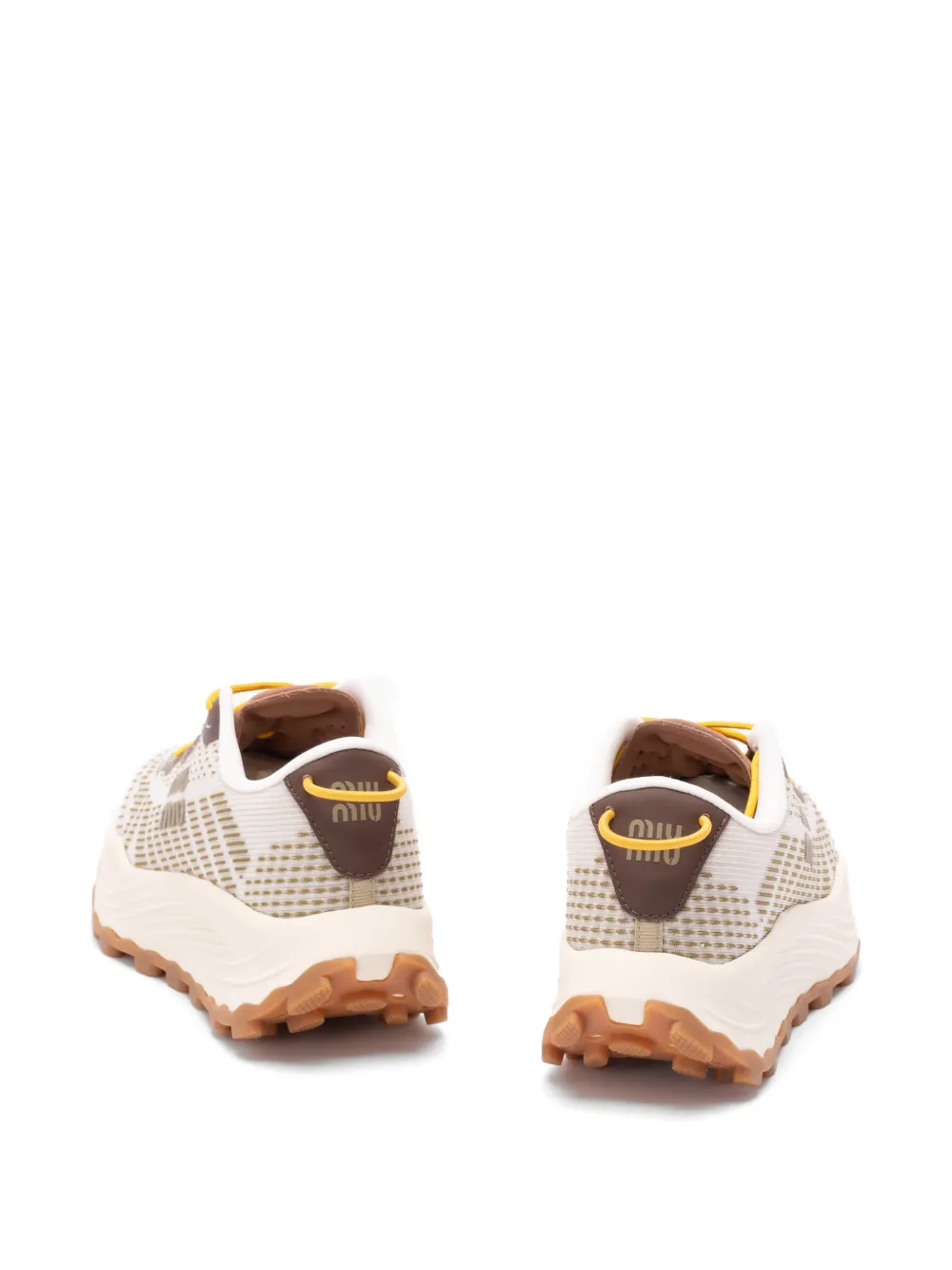 Miu Sneakers met logopatroon Beige