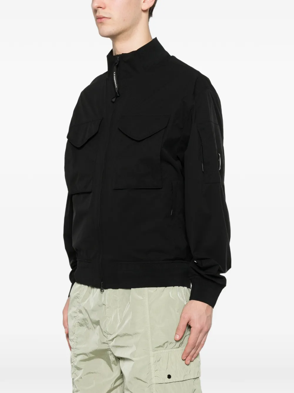 C.P. Company Jack met klepzak Zwart