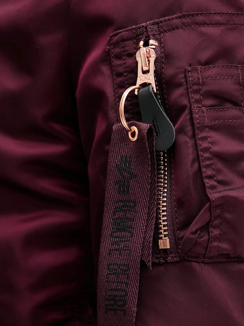 Alpha Industries Bomberjack met ritszak Paars