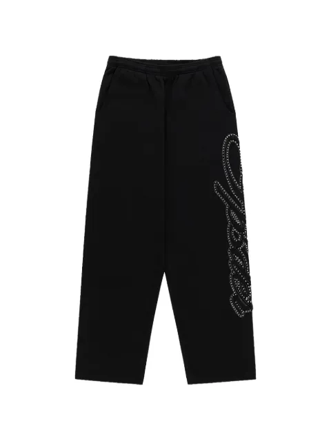 SP5DER rhinestone-embellished track pants