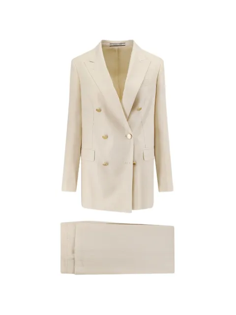 Tagliatore traje con doble botonadura