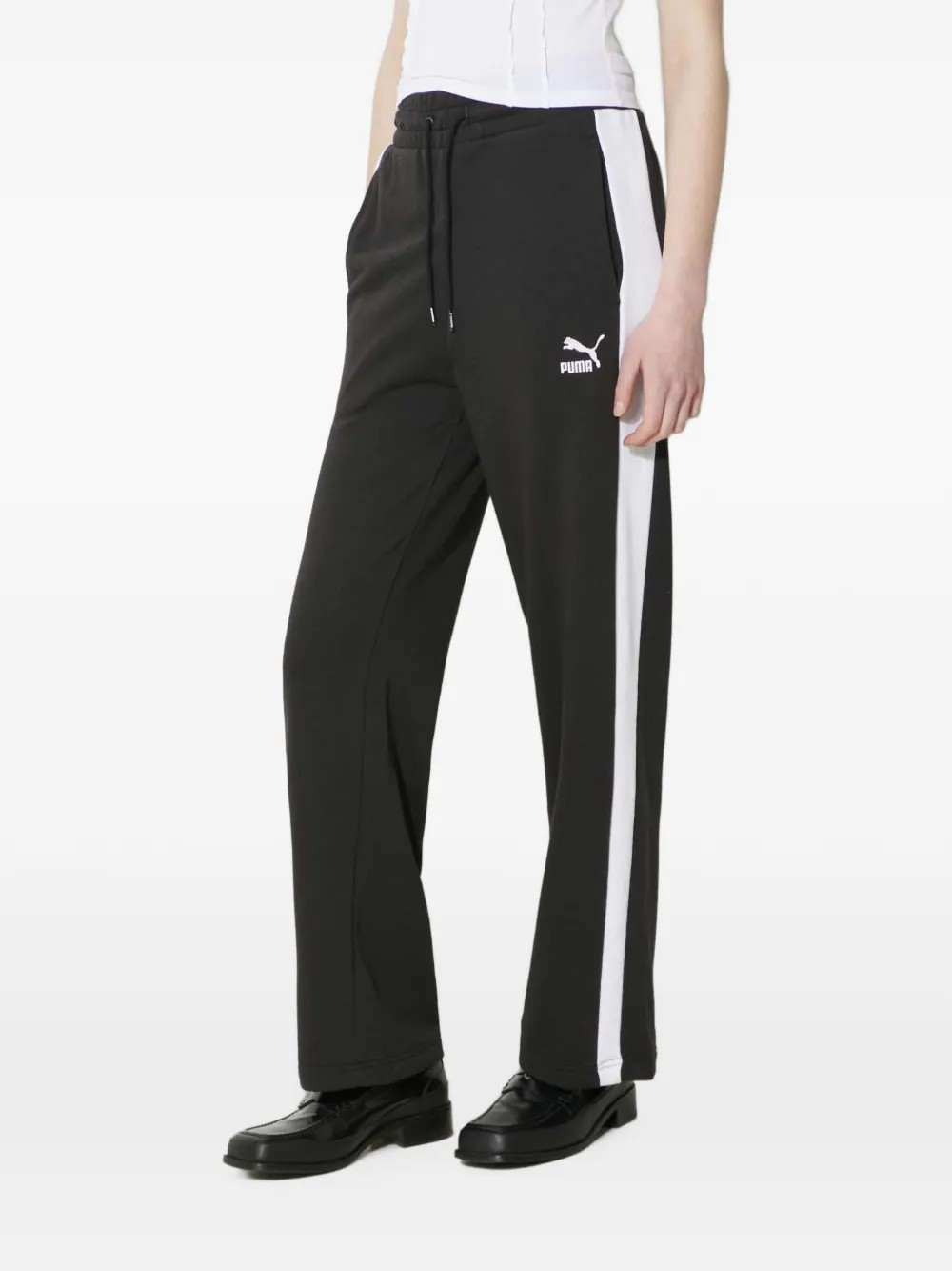 PUMA Iconic T7 broek met logo en streep Zwart