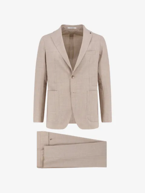 Tagliatore blazer con bolsillos y solapas de flor