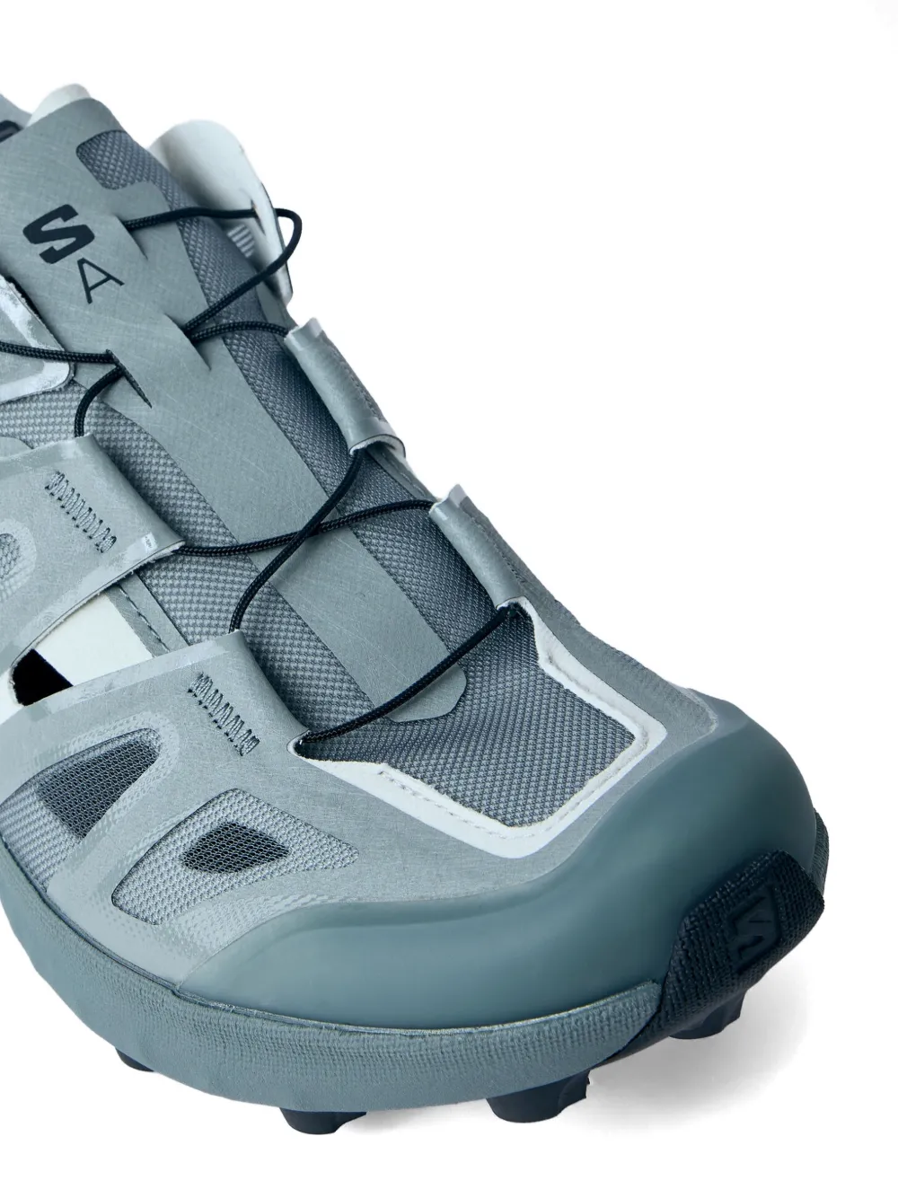 Salomon Udara sneakers met logo-reliëf Blauw