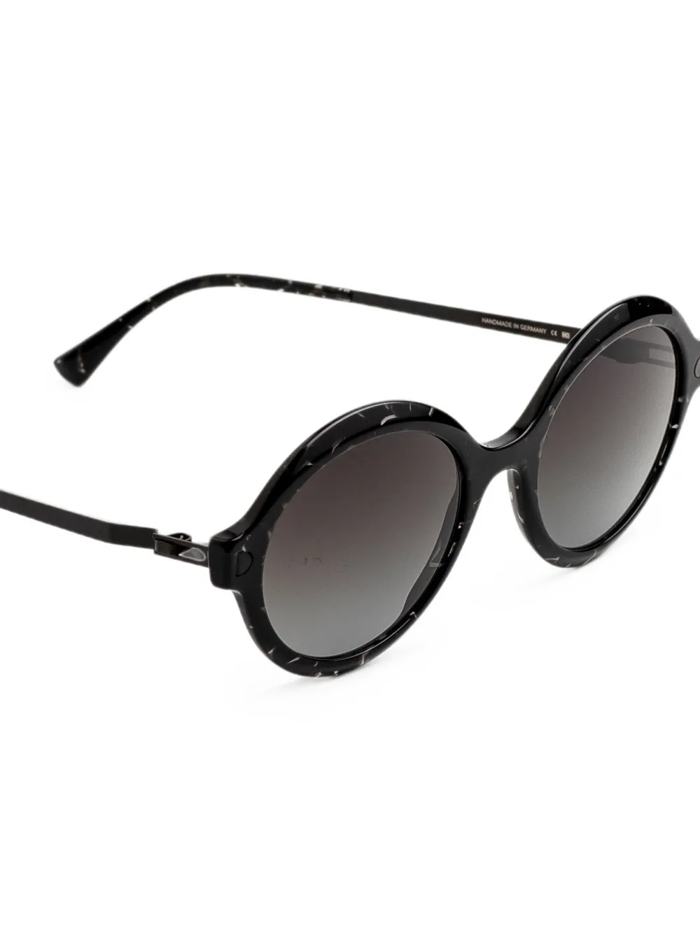 Mykita Noomi zonnebril met rond montuur Zwart