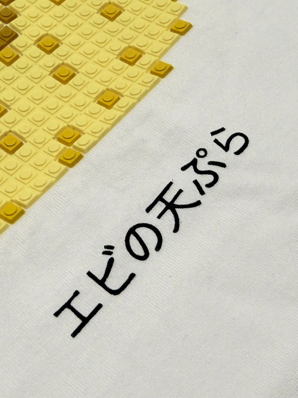 Mostly Heard Rarely Seen 8-Bit T-shirt met ring Wit
