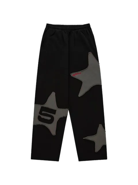 SP5DER star-motif wide-leg track pants