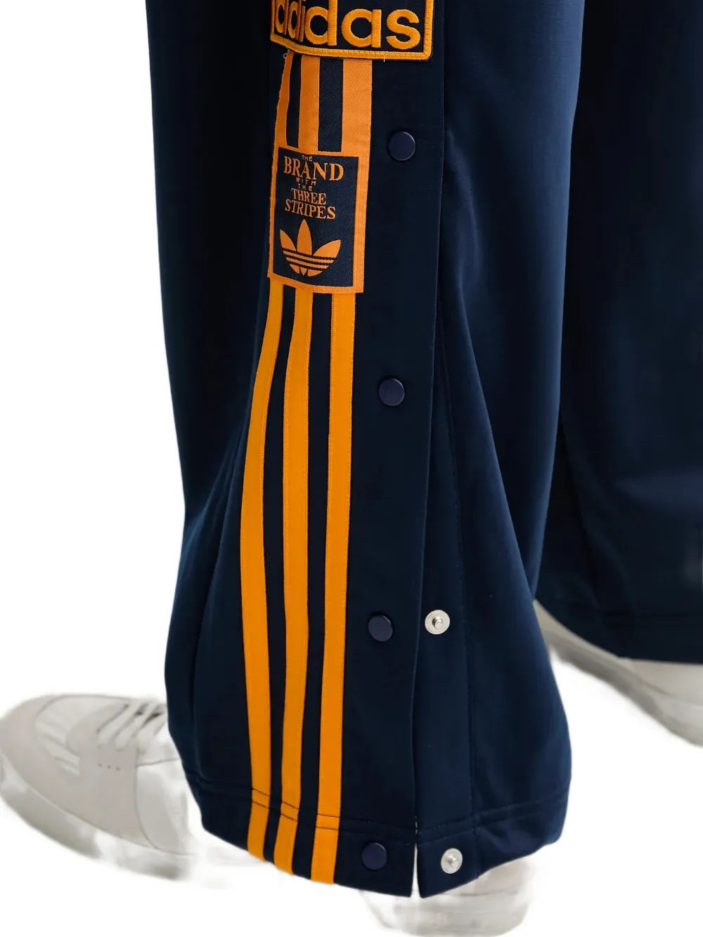 adidas Broek met zijstreep en drukknopen Blauw