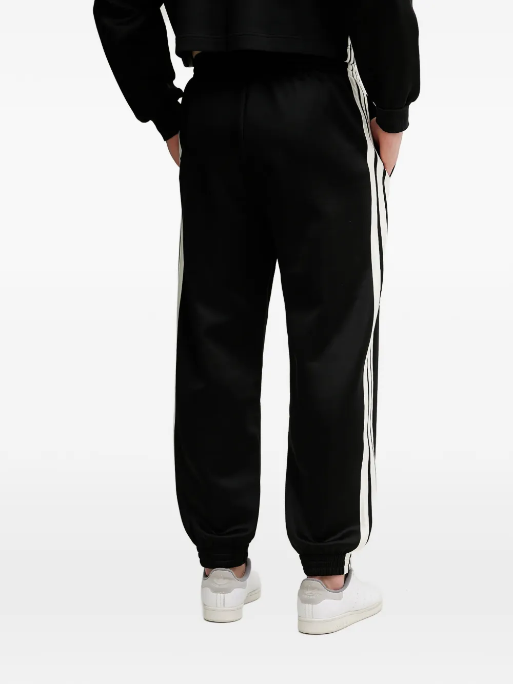 adidas Stadium side-stripe track pants Zwart