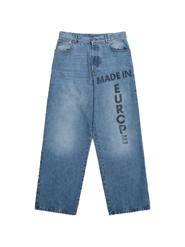 VETEMENTS text-print Jeans | Blue | FARFETCH