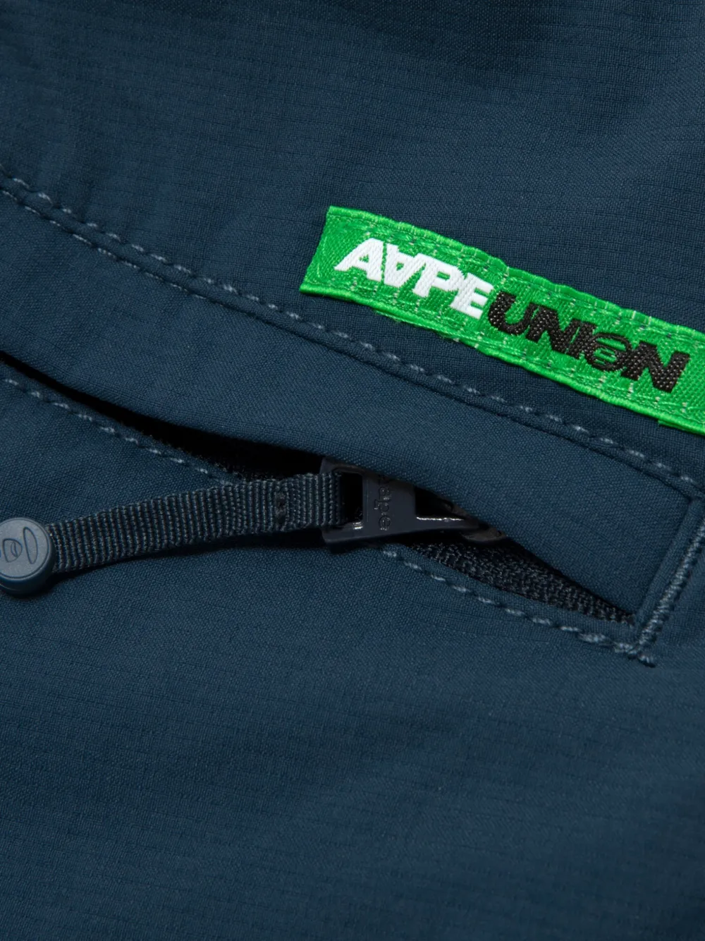 AAPE BY *A BATHING APE Trainingsbroek met logopatch Blauw