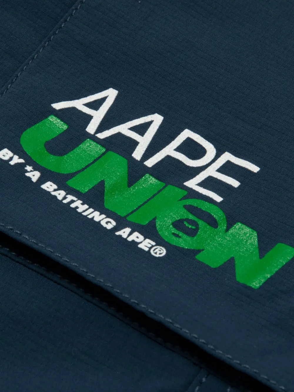 AAPE BY *A BATHING APE Trainingsbroek met logopatch Blauw