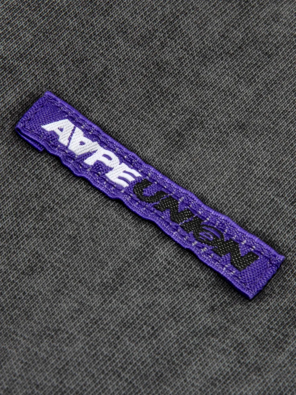 AAPE BY *A BATHING APE Broek met wijde pijpen en applicatie Grijs