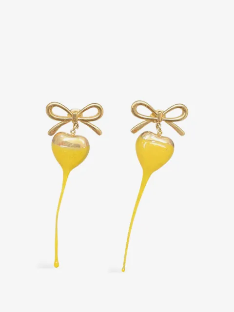 Ottolinger aretes con dije de corazón y detalle de moño