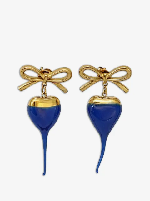 Ottolinger aretes con dije de corazón y detalle de moño