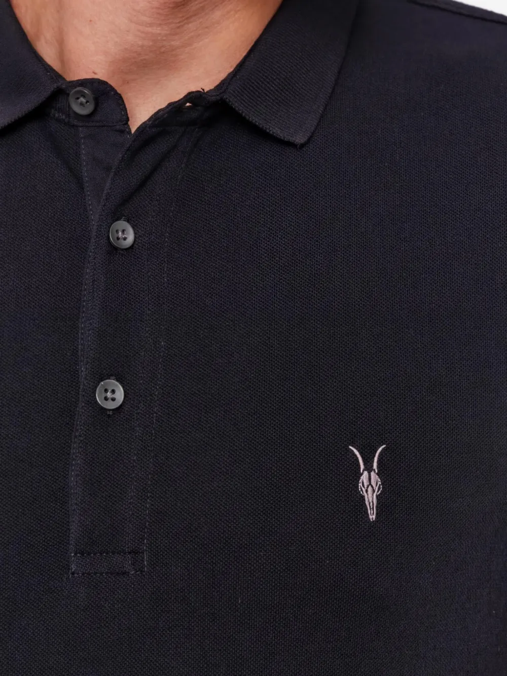 AllSaints Ramskull poloshirt met borduurwerk Zwart