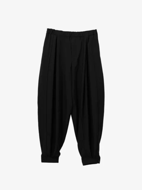 Black Comme Des Garçons pleated trousers