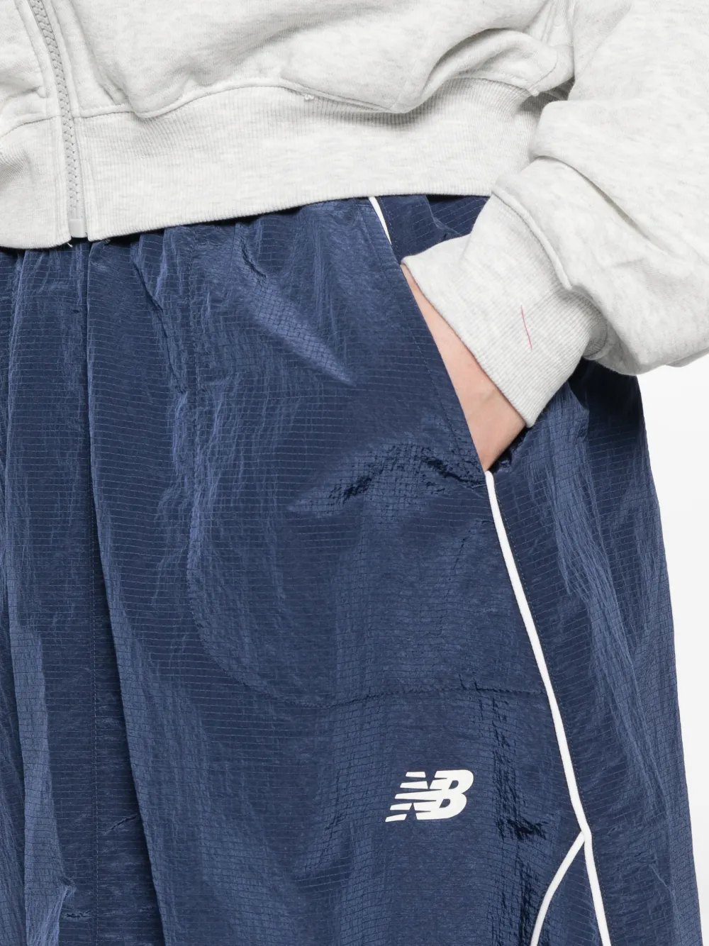 New Balance Sport Legacy rok met trekkoord en logo Blauw