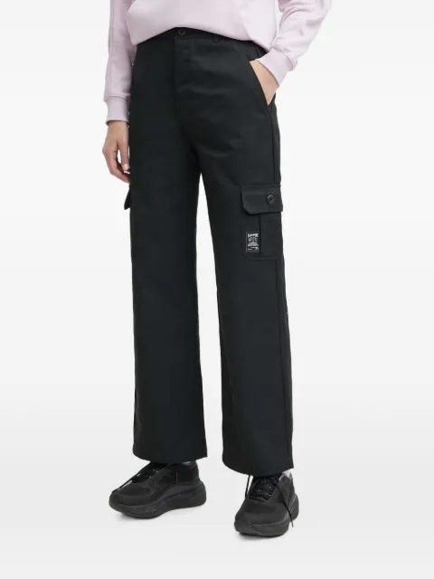 Champion pantalones con parche del logo