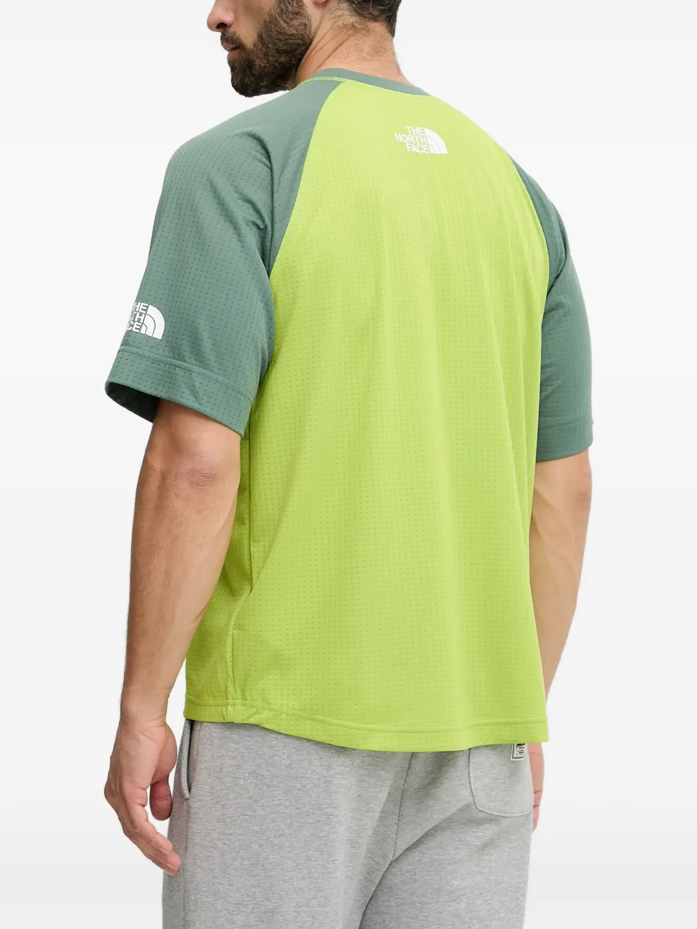 The North Face T-shirt met logoprint en raglan mouwen Groen