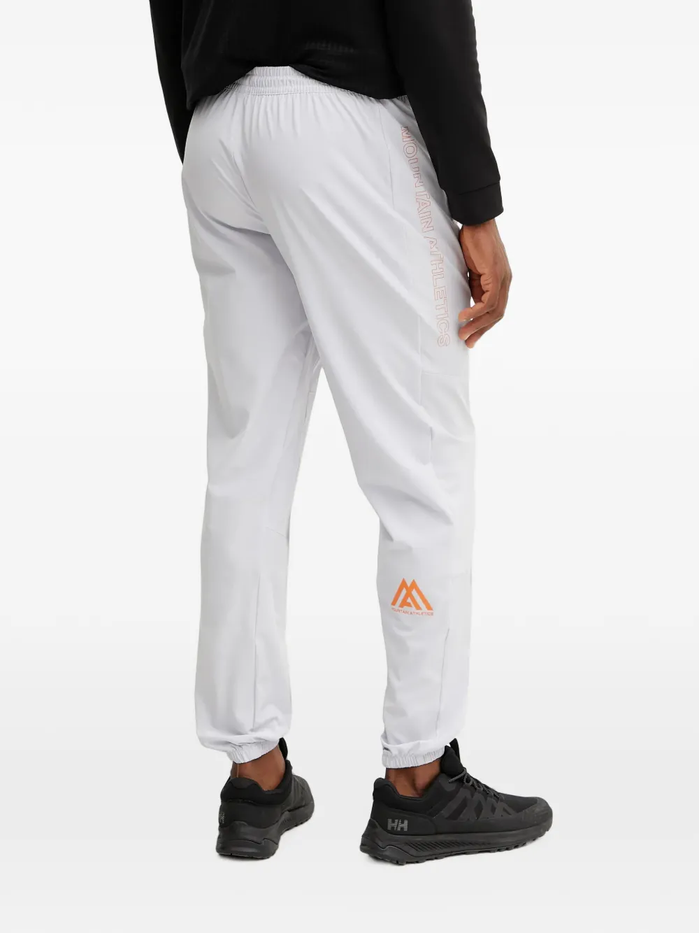 The North Face Mountain Athletics logo-print track pants Grijs