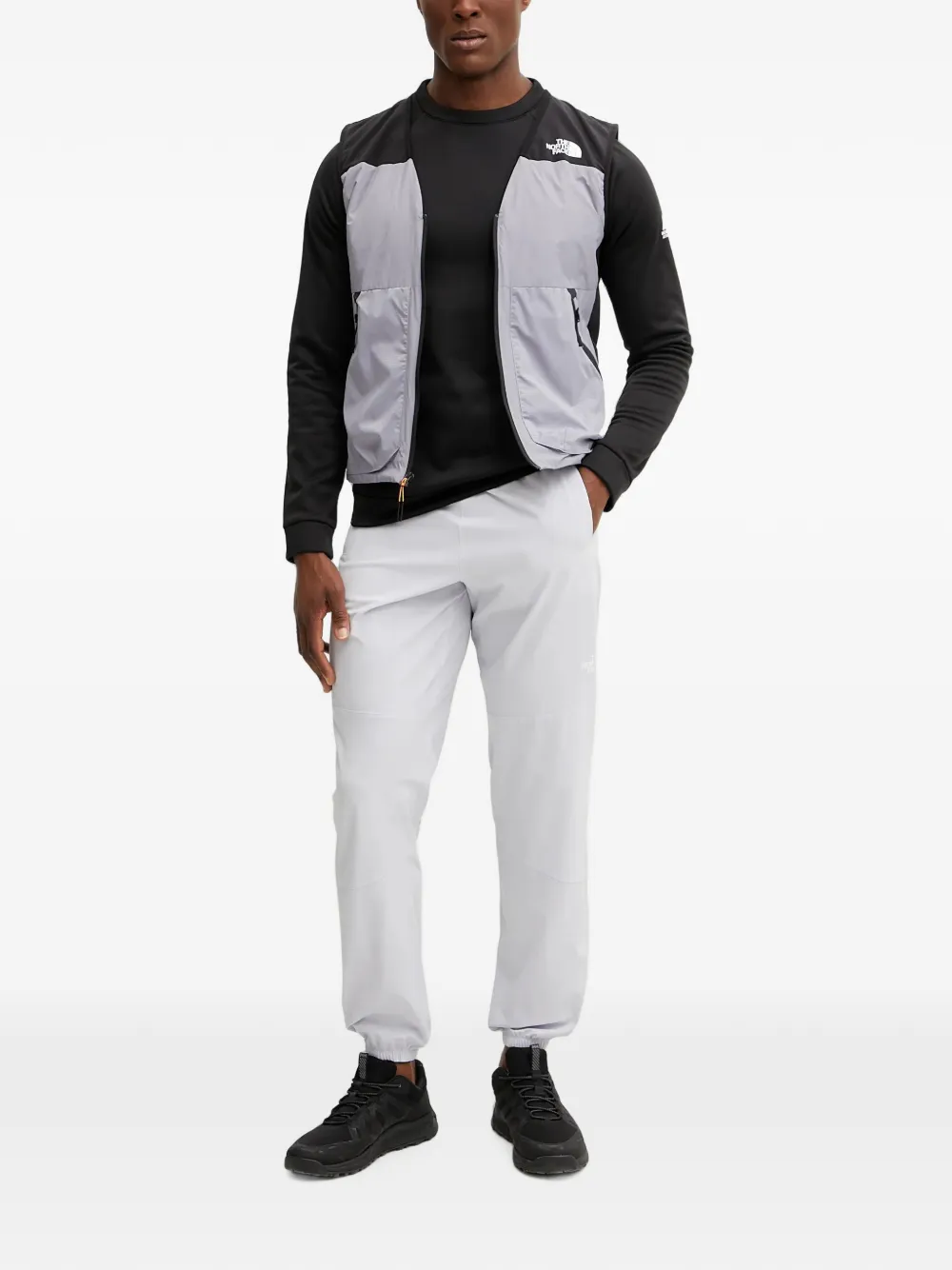 The North Face Mountain Athletics logo-print track pants Grijs