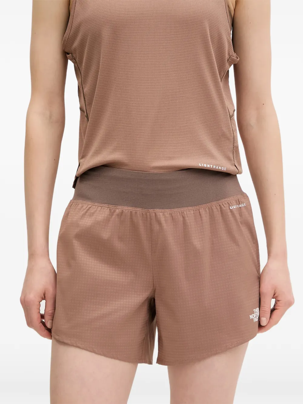 The North Face Shorts met rits en zak Bruin