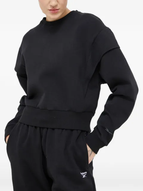 Reebok sudadera corta
