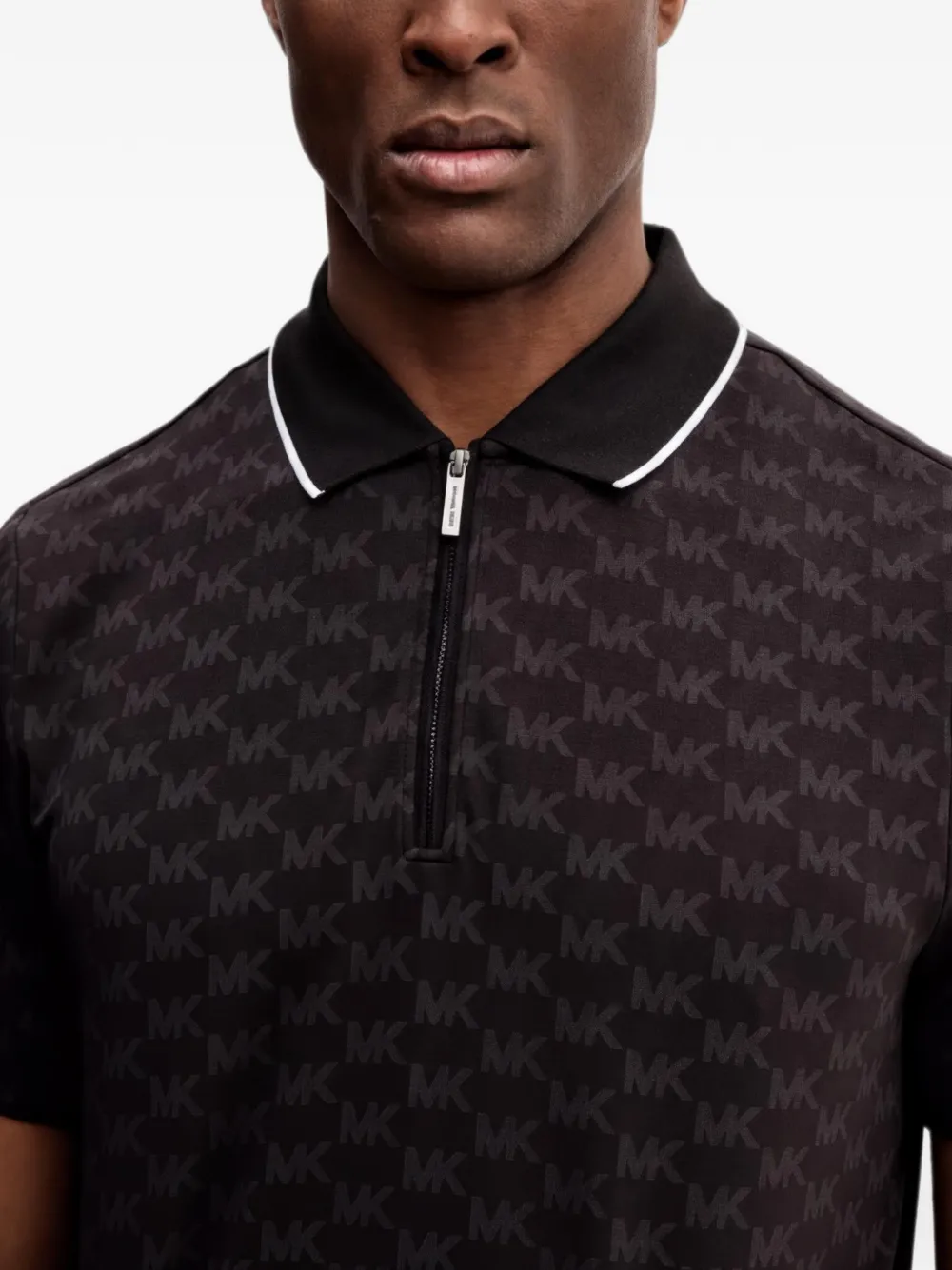 Michael Kors Poloshirt met monogram-patroon en rits Zwart