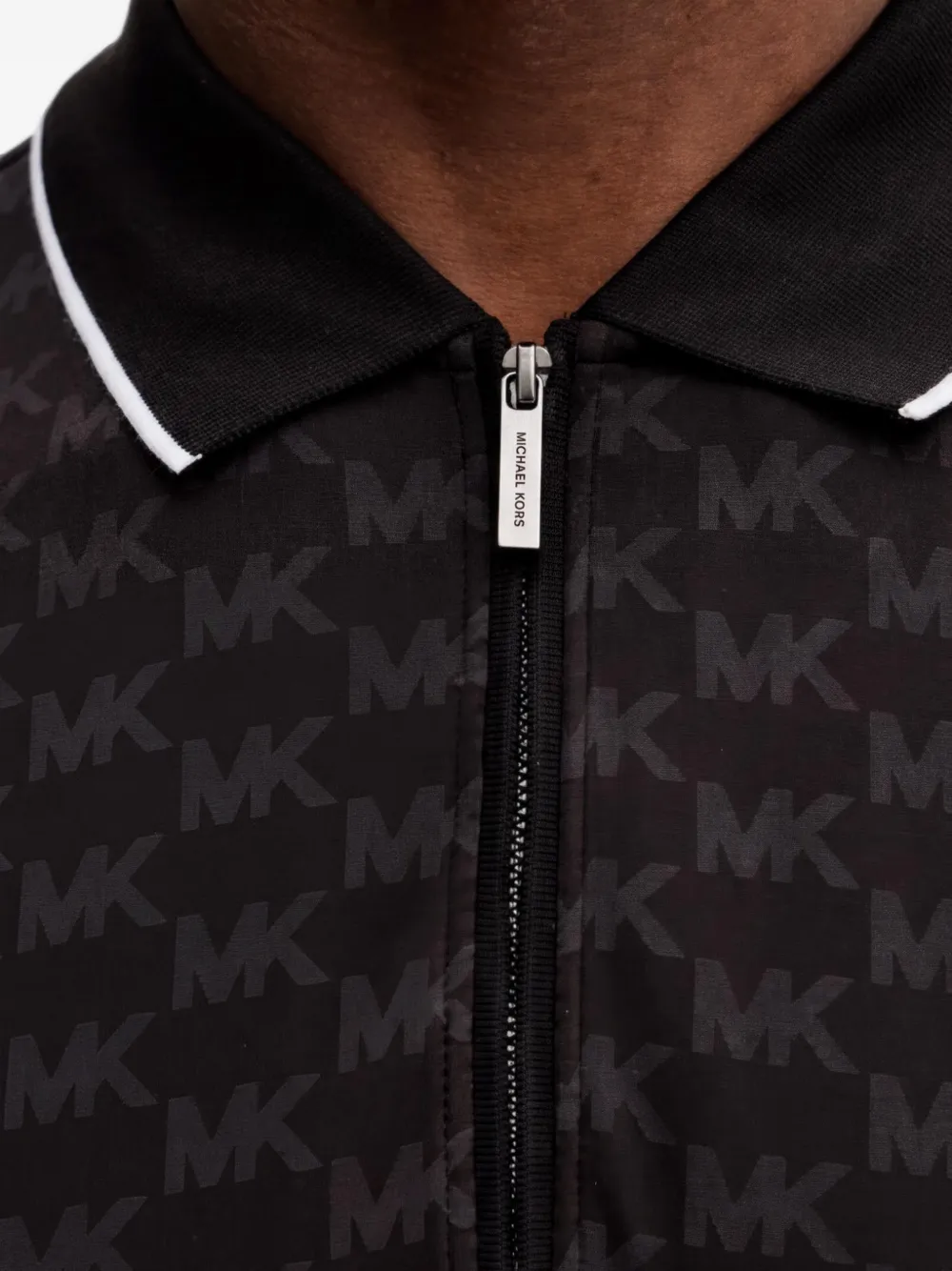Michael Kors Poloshirt met monogram-patroon en rits Zwart