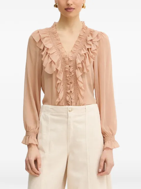 Morgan top con volantes y cuello en V
