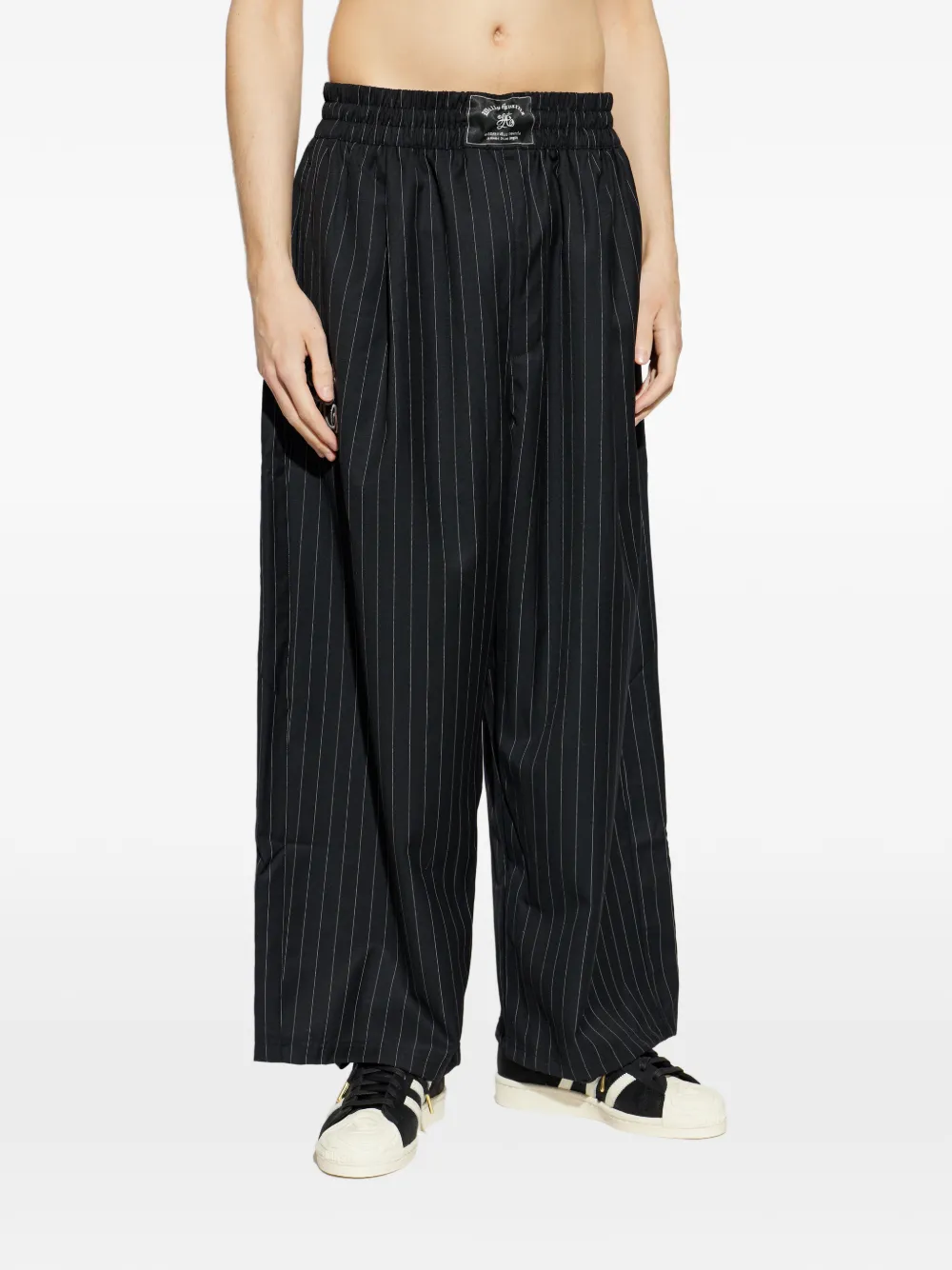 adidas Chavarria broek met wijde pijpen en krijtstreep Zwart