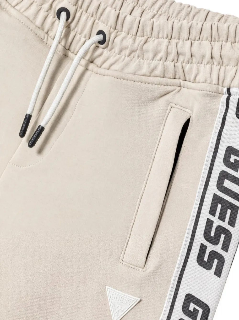 guess kids Trainingsbroek met zijstreep en logoband Beige