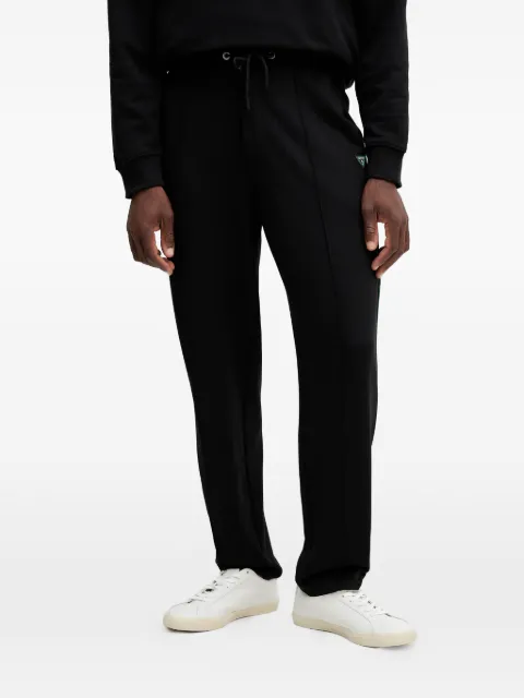 GUESS USA logo-patch drawstring track pants