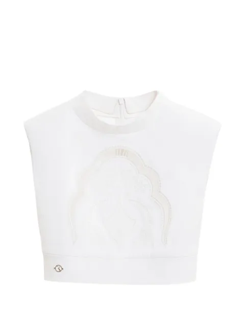 Saiid Kobeisy top corto con perforaciones