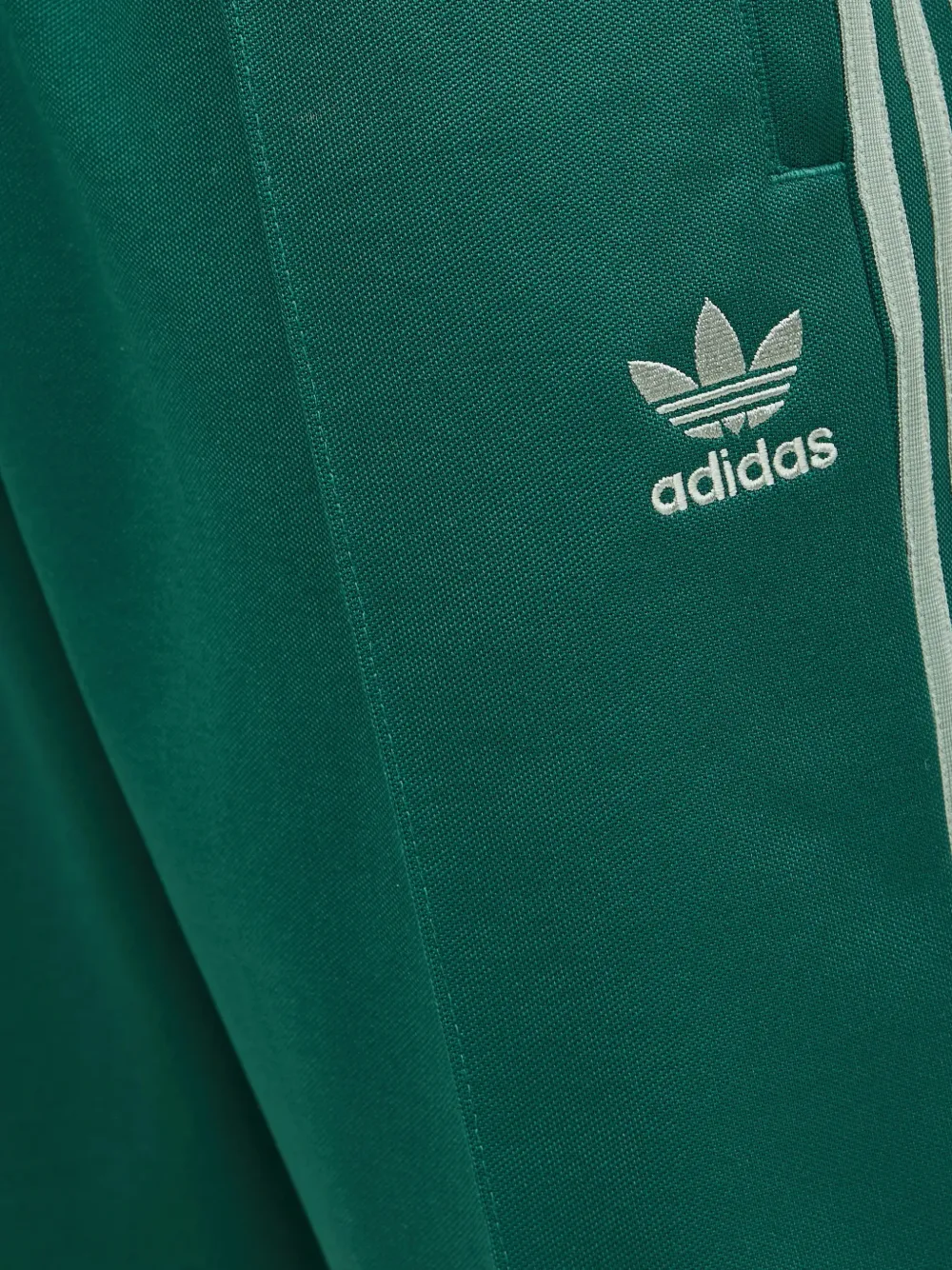 adidas Firebird side-stripes track pants Groen