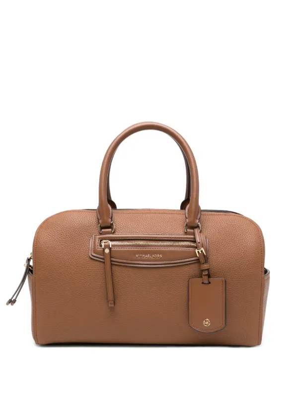 jet set medium travel tote bag Michael Michael Kors Logo Embossed Leather Constructed with a roomy interior and ample pockets Brown Zip Tote Jet Set