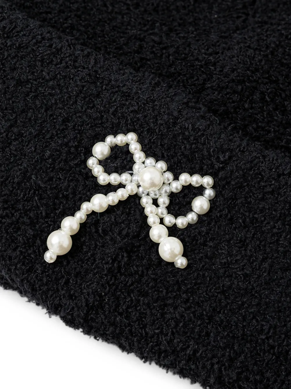 Kangol Bouclé muts verfraaid met parels Zwart